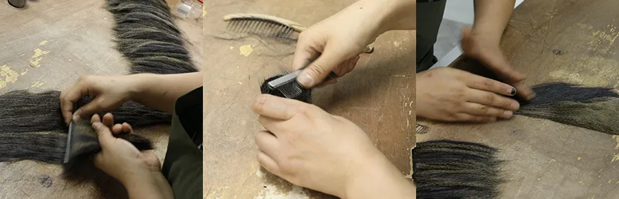 Hands combing and refining natural brush hair to remove impurities and select high-quality bristles, demonstrating a key step in makeup brush manufacturing for softness and uniformity.