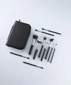 Open V101 makeup brush set case revealing full 12-piece synthetic hair brushes arranged neatly for easy access and portability.