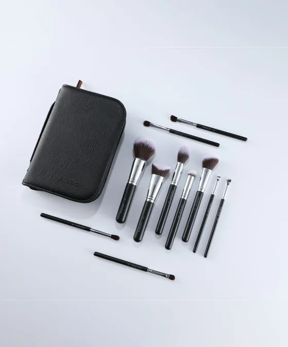 Open V101 makeup brush set case revealing full 12-piece synthetic hair brushes arranged neatly for easy access and portability.