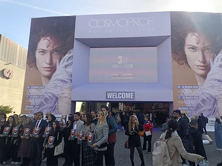 Group photo of AINOCHI Factory representatives attending the 2023 Cosmoprof Italy Beauty Expo.