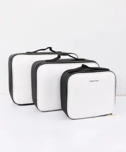Three different sizes of AINOCHI professional artist leather makeup bags displayed side by side.