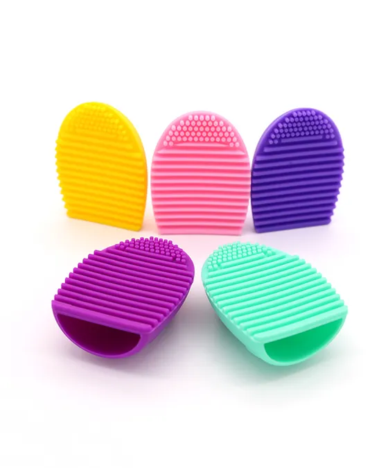“Set of colorful silicone multi-use wash brush eggs for cleaning makeup brushes and sponges, featuring practical textured surfaces.