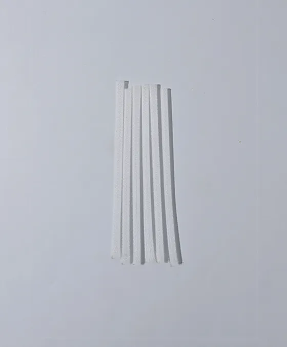 Small mesh brush guard for eye brushes, shown in packaging.