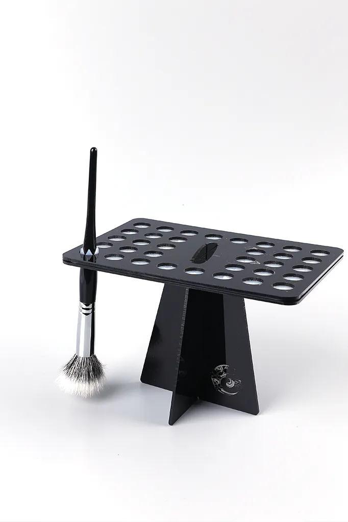 Innovative makeup brush cleaning rack and tools for thorough brush maintenance and hygiene.